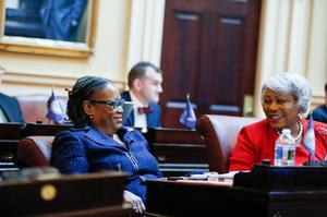 On the Senate floor with Senator Louise Lucas.
